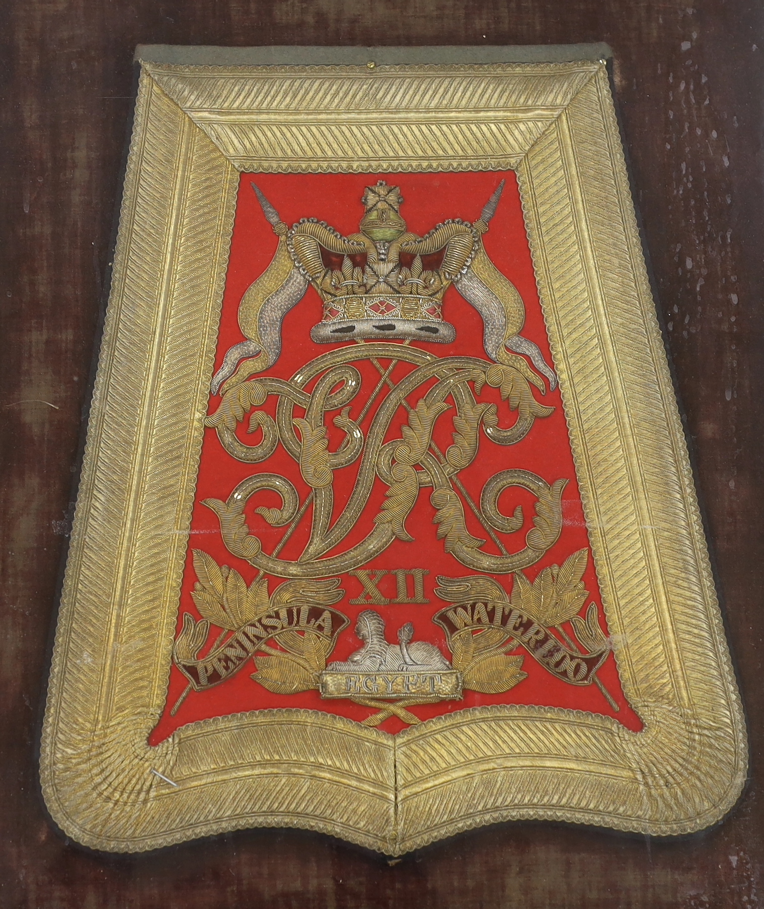 An early Victorian officer's full dress embroidered sabretache flap of the 12th (Prince of Wales's) Royal Lancers, framed and glazed (missing pouch and loops)